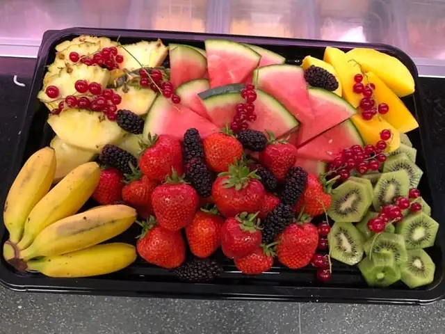 Fruit platter of watermelon, berries, kiwi and banana